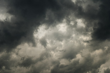 Fototapeta na wymiar Dramatick dark sky and black clouds in summer season
