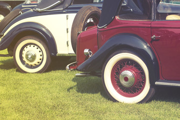 Vintage Car Wheels - Classic Vehicles in line