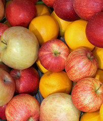 ripe apples and oranges orange
