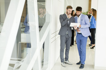 Businessmen with tablet