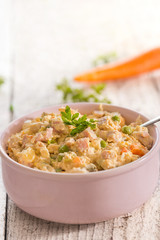 Russian salad with vegetables and meat