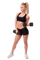 Fototapeta premium posing fitness sexy woman with dumbbells isolated on white background