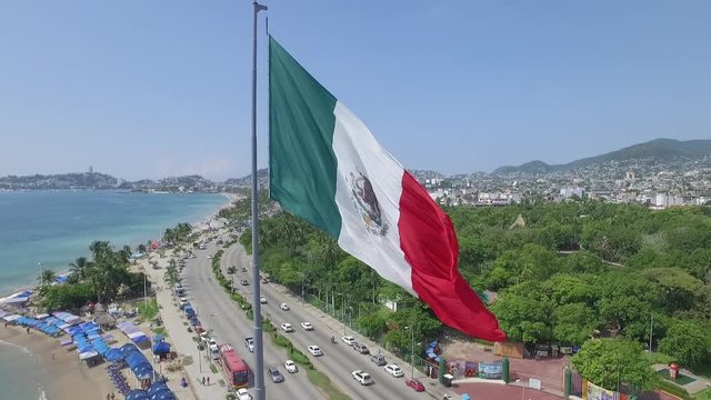 Full shot of a flag on the coast