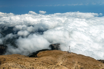 Turkey, mountain Tahtali. View of cableway, walking under the clouds