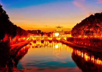 Fototapeta premium View of St. Peter's Basilica and Aelian Bridge at dusk in Rome