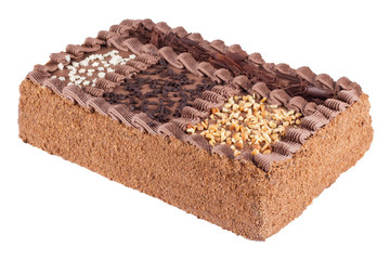 Tasty creamy chocolate cake on the white background
