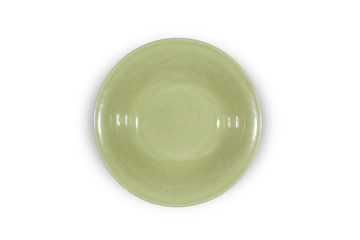 Soup deep green plate with round shoulders on white background directly from above