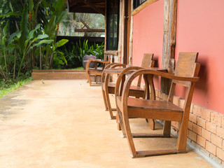 Wood table and chair in front of a wall