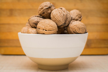 walnuts in a bowl on a table