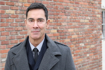 Mature handsome Caucasian businessman smiling