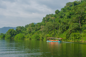 Fototapeta na wymiar ship with tourists on the lake in Indochina