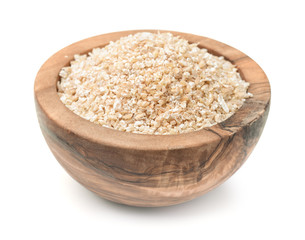 Wooden bowl of barley grits