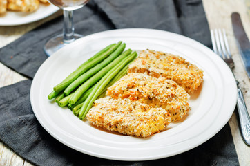 Bread crumbs cheese herbs baked cod with green beans