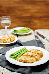 Bread crumbs cheese herbs baked cod with green beans