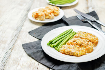 Bread crumbs cheese herbs baked cod with green beans