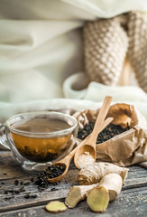 still life with transparent Cup of tea on wooden background