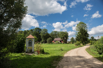 Field with country road
