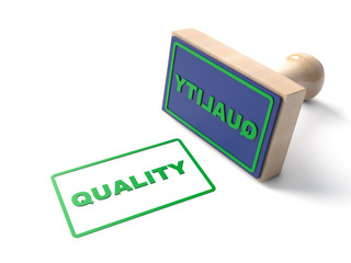 Red superior quality stamp with wooden stamper isolated on white background.