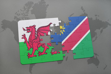puzzle with the national flag of wales and namibia on a world map