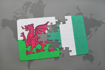 puzzle with the national flag of wales and nigeria on a world map