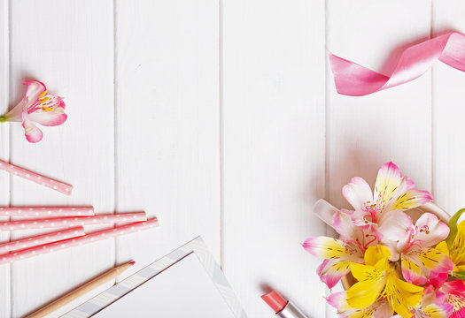 Flowers, paper straws, pink ribbon and other cute objects
