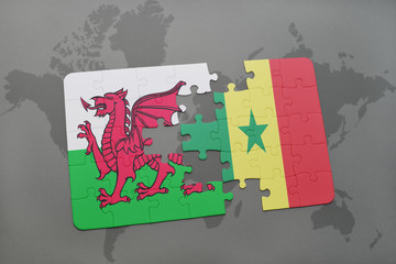 puzzle with the national flag of wales and senegal on a world map