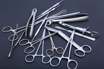 Surgical instruments and tools on table for a surgery