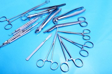Surgical instruments and tools on table for a surgery