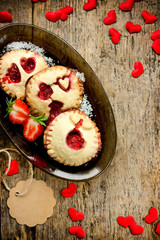 Valentines day festive food cookies with fresh strawberries