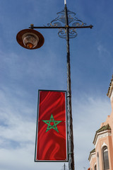 Morocco flag in city lights