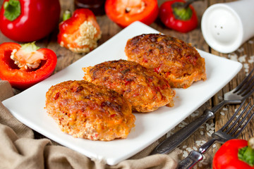 Lazy meat zrazy or cutlets with rice and red pepper