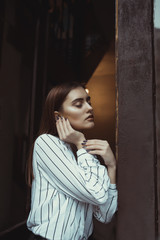 Fototapeta premium Sensual brunette woman with radiance skin and nude makeup