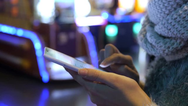 woman writing sms bokeh