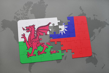 puzzle with the national flag of wales and taiwan on a world map