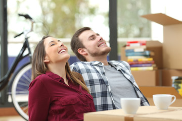 Couple relaxing and moving house