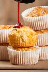 Homebaked Ham And Cheese Muffins In Paper Cases. Ketchup.