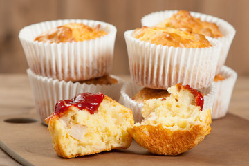 Homebaked Ham And Cheese Muffins In Paper Cases. Ketchup.