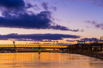 View from harbour at sunset, Bratislava castle, business buildin