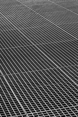 Iron gutter grates and metal vent grids as black and white indus