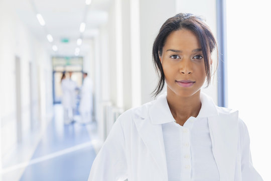 Portrait of female doctor in hospital corridor