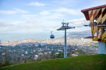 Fototapeta premium Flew on a scenic cable car seen Batumi aerial view.