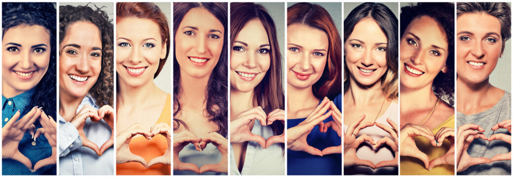 Multiethnic group of happy women making heart sign with hands
