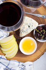 red wine and snacks top view