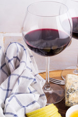 red wine, cheese on a tray