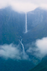 Landscape with views of the largest waterfall in the clouds. The county of More og Romsdal. Norway