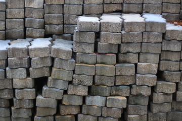 Piles of concrete blocks for pavement construction