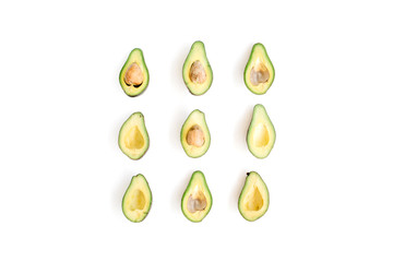 Sliced raw avocado arrangement. Flat lay, top view. Creative food concept