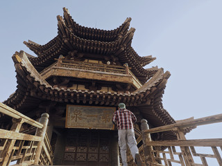 Fototapeta premium Ancient Chinese wooden pagoda,Near Crescent Moon Spring