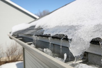 Ice on roof and gutters © soupstock