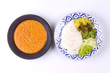 Rice noodle and fish curry in coconut milk with herb.